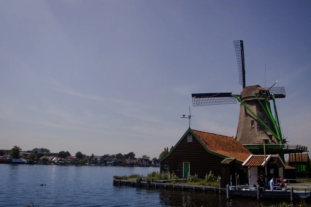a building next to a body of water