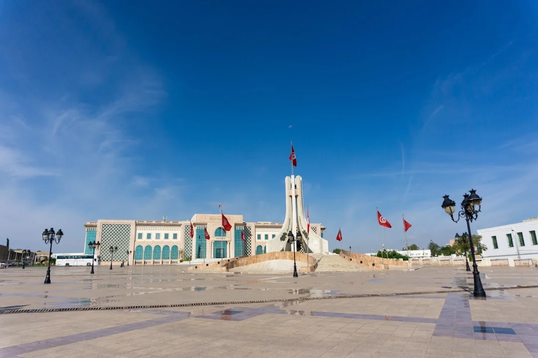 A large building with a clock tower in the middle of it